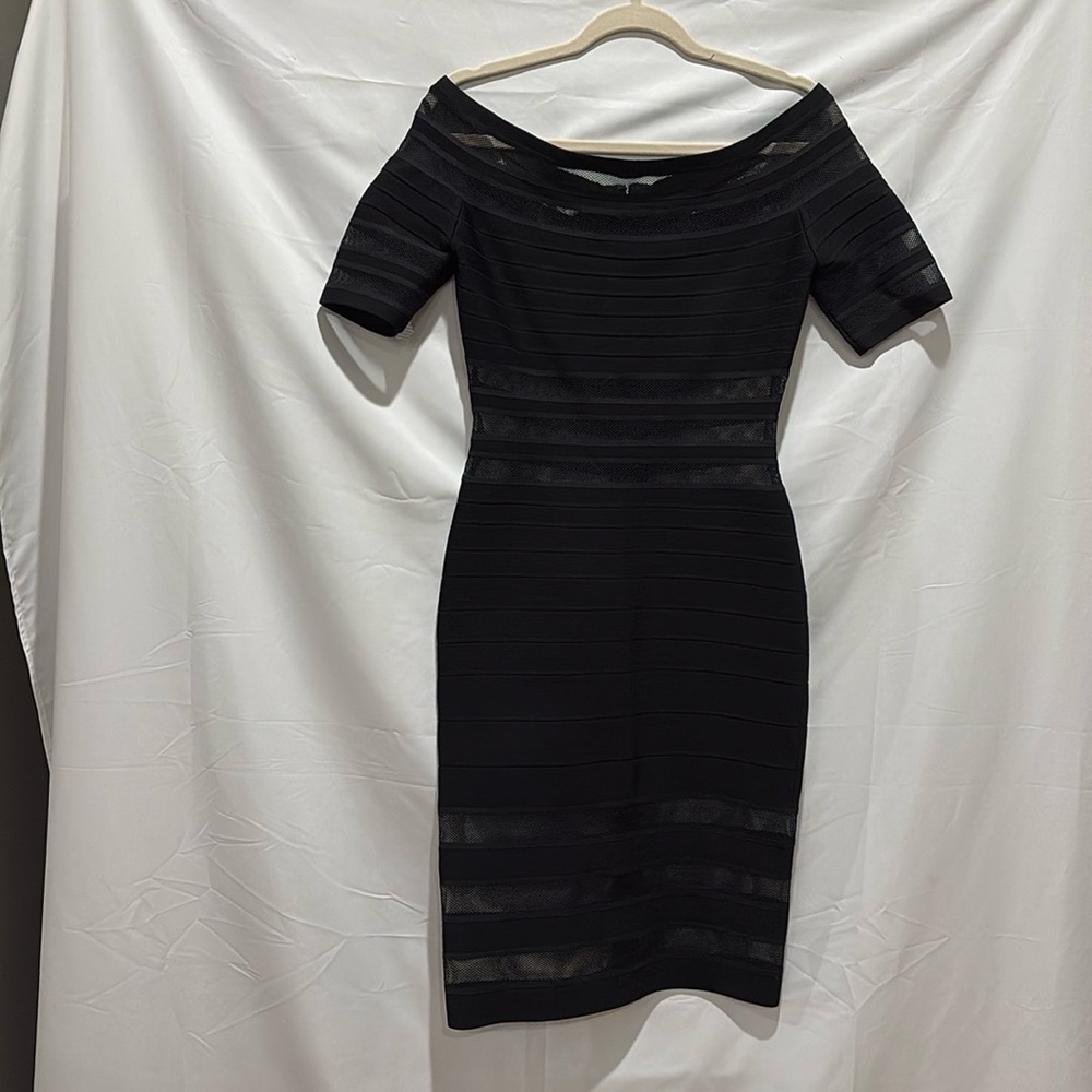 Bandage dress that is sheer at bottom, midriff, neckline and sleeves